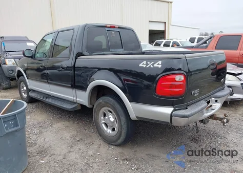 2001 Ford F-150 King Ranch Edition/Lariat/Xlt z USA, uszkodzony, nr VIN 1FTRW08L61KA21736